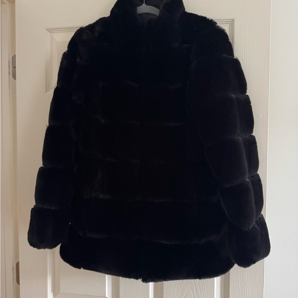 Luxurious reversible black faux fur jacket